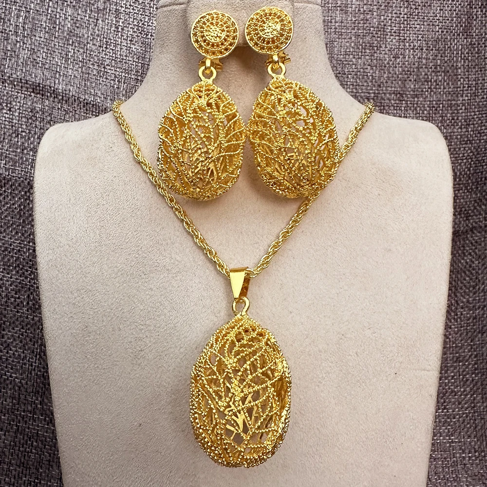 Ethiopian Gold Color jewelry sets 24k Big Pendant Necklace Earring Dubai jewelry sets for women African wedding Jewelry Set
Ethiopian Gold Color jewelry sets 24k Big Pendant Necklace Earring Dubai jewelry sets for women African wedding Jewelry Set