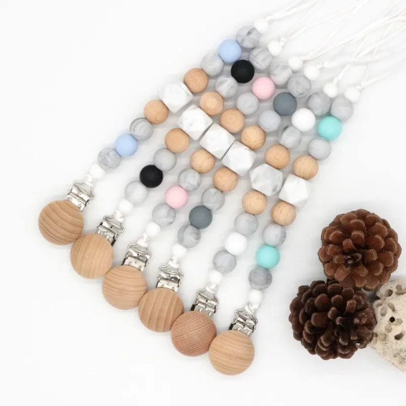 Baby Pacifier Clips Wood Safe Silicone Beads Infant Dummy Nipple Clip Holder Teething Chain Newborn Soother Teether Chew Toys
Baby Pacifier Clips Wood Safe Silicone Beads Infant Dummy Nipple Clip Holder Teething Chain Newborn Soother Teether Chew Toys
