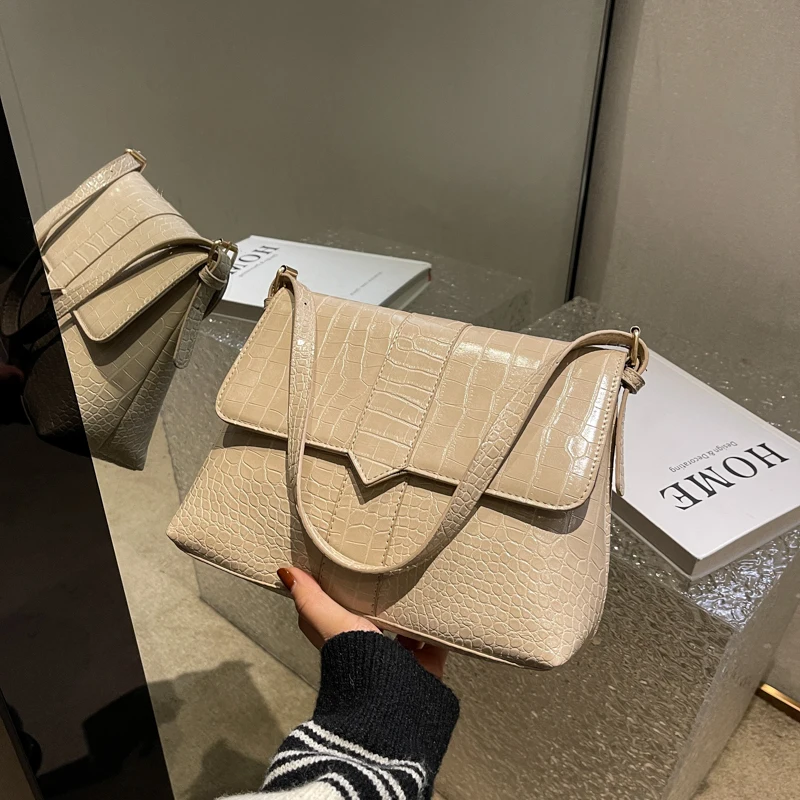 Women's new style shoulder bag stone grain messenger bag flip type women's bag zipper women's bag
Women's new style shoulder bag stone grain messenger bag flip type women's bag zipper women's bag