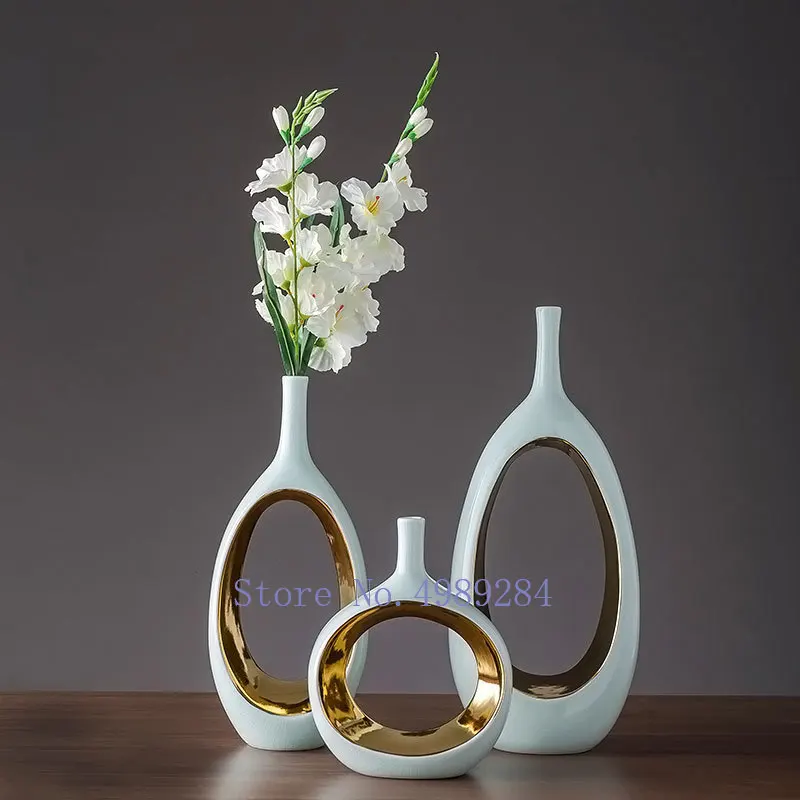 Creative modern Nordic ceramics vase Golden hollow Flower arrangement Home living room desktop Decorative ornaments
Creative modern Nordic ceramics vase Golden hollow Flower arrangement Home living room desktop Decorative ornaments