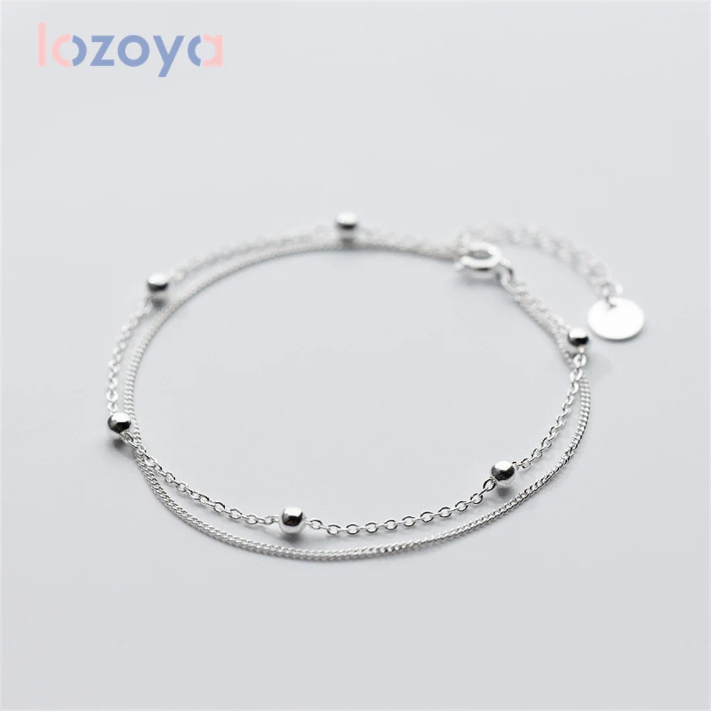 Роскошный браслет LOZOYA для женщин, модная цепочка с двумя бусинами, цепочка с цирконом, свадебные украшения, аксессуары, подарки
Роскошный браслет LOZOYA для женщин, модная цепочка с двумя бусинами, цепочка с цирконом, свадебные украшения, аксессуары, подарки