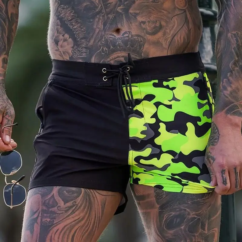 Fashion beach shorts 2022 summer casual swimming trunks five-point pants stitching two-color camouflage men's shorts
Fashion beach shorts 2022 summer casual swimming trunks five-point pants stitching two-color camouflage men's shorts