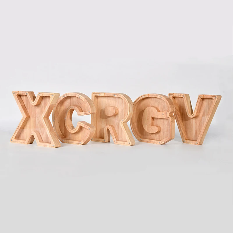 Wooden 26 Letters Coin Bank Storage Box Piggy Bank Home Desktop Ornament Decor Wood Crafts Christmas Birthday Gift Selections
Wooden 26 Letters Coin Bank Storage Box Piggy Bank Home Desktop Ornament Decor Wood Crafts Christmas Birthday Gift Selections