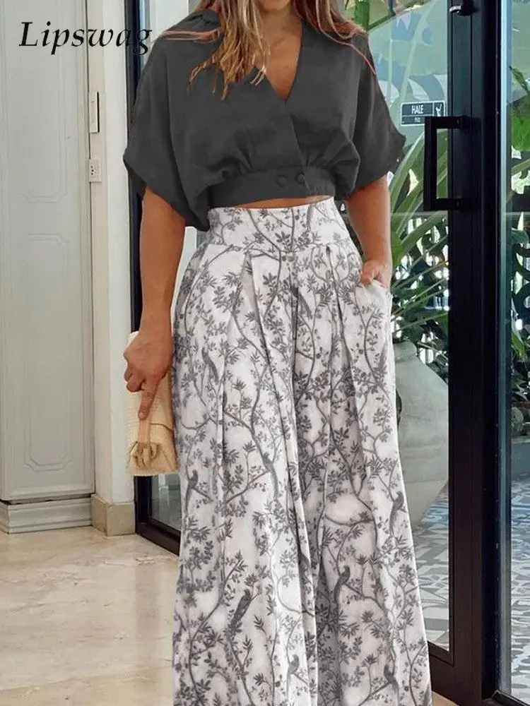 Women's Office Two Piece Set Summer V Neck Loose Top Printed Trousers Loose Sets Sexy Short Sleeve Wide Leg Pant Women Outfits
Women's Office Two Piece Set Summer V Neck Loose Top Printed Trousers Loose Sets Sexy Short Sleeve Wide Leg Pant Women Outfits