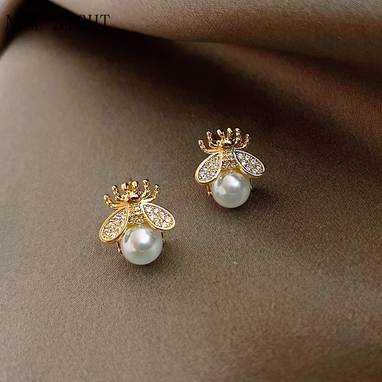 New Sight Simple Luxurious Pearl Woman's Earrings Fashion Design Sense Bee Insect Earrings Korean Women Jewelry Sexy Earrings
New Sight Simple Luxurious Pearl Woman's Earrings Fashion Design Sense Bee Insect Earrings Korean Women Jewelry Sexy Earrings