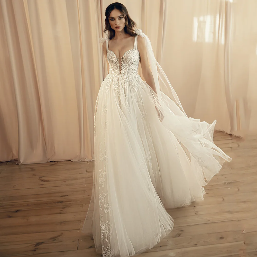 Bow Wedding Dresses Luxury Tulle Spaghetti Straps V-Neck Bride Dress 2022 Floor Length Lace Applique Wedding Gowns Beaded Custom
Bow Wedding Dresses Luxury Tulle Spaghetti Straps V-Neck Bride Dress 2022 Floor Length Lace Applique Wedding Gowns Beaded Custom