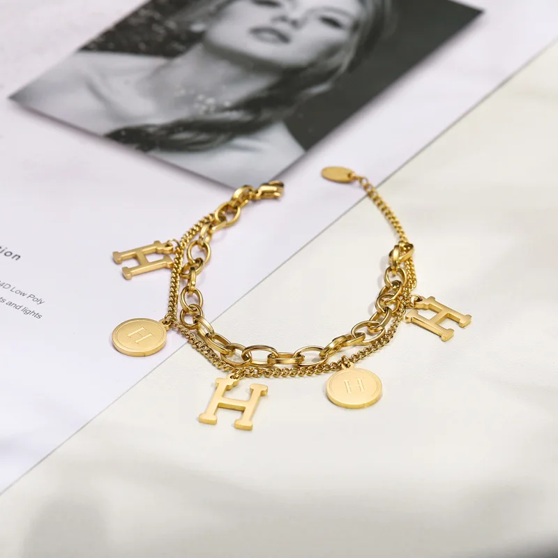 CARLIDANA Luxury 18 K Stainless Steel Letter Charm Bracelet Gold Plated Letter H Initial Bracelet Waterproof Jewelry for Women
CARLIDANA Luxury 18 K Stainless Steel Letter Charm Bracelet Gold Plated Letter H Initial Bracelet Waterproof Jewelry for Women