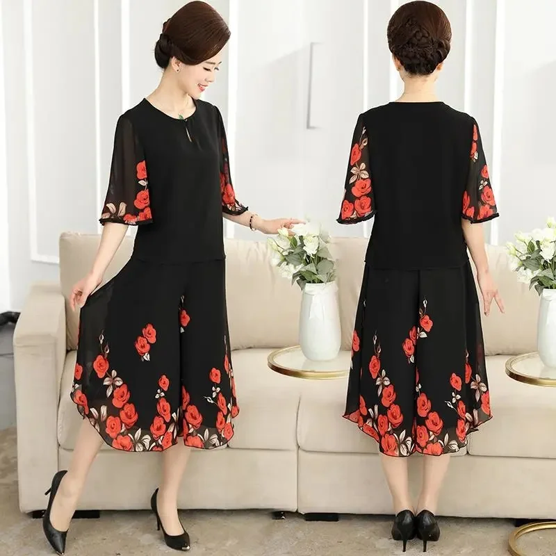 Mother Summer Suits Chiffon Black Print O-Neck Top Skirt Pants Suit Short-Sleeve Elderly Women 2 Piece Women Size 6XL Elegant
Mother Summer Suits Chiffon Black Print O-Neck Top Skirt Pants Suit Short-Sleeve Elderly Women 2 Piece Women Size 6XL Elegant