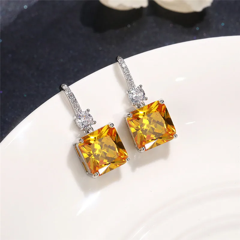Ne'w Gorgeous Princess Cut Yellow Cubic Zirconia Dangle Earrings Women Wedding Ceremony Party Bridal Accessories Trend Jewelry
Ne'w Gorgeous Princess Cut Yellow Cubic Zirconia Dangle Earrings Women Wedding Ceremony Party Bridal Accessories Trend Jewelry