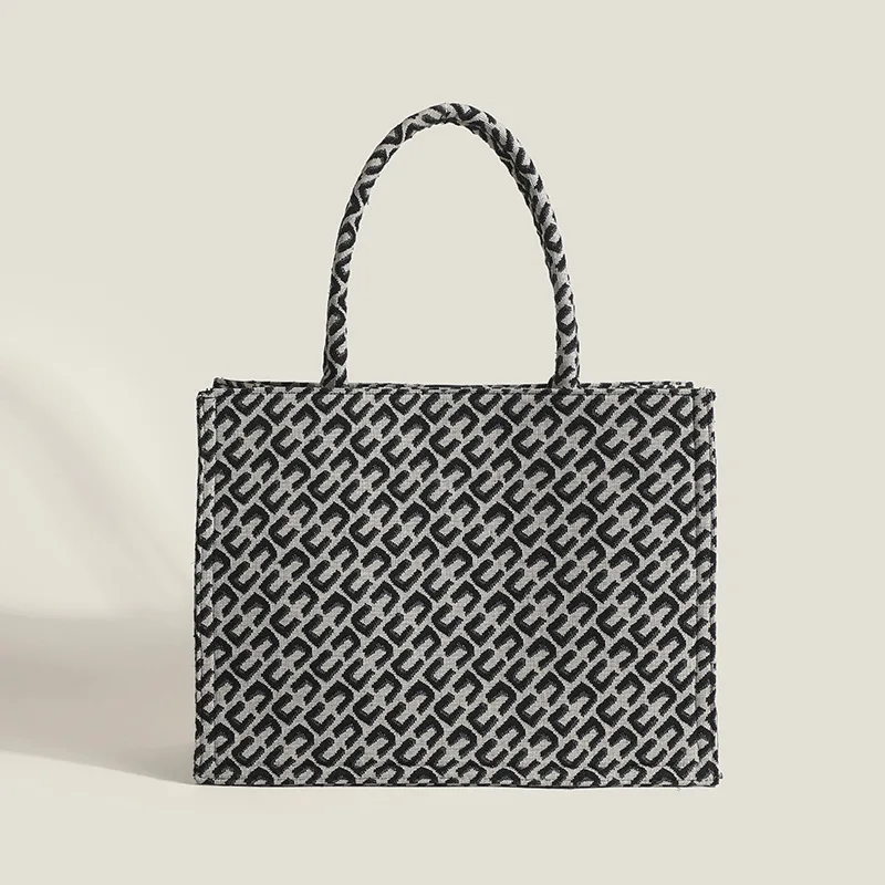 Women's Bag 2022 Spring and Summer New Niche Jacquard Portable Retro Large Capacity Shoulder Tote Bag
Women's Bag 2022 Spring and Summer New Niche Jacquard Portable Retro Large Capacity Shoulder Tote Bag