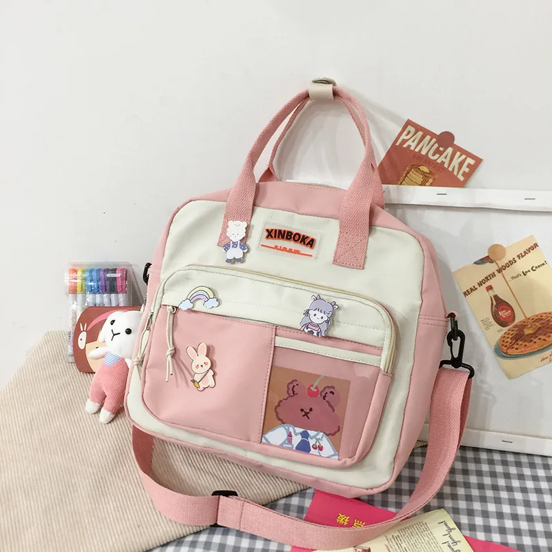 Zipper Crossbody Bag Cute Multifunctional Handbag with Cartoon Charm School Bag Student Messenger Bag Nylon Shoulder Backpack
Zipper Crossbody Bag Cute Multifunctional Handbag with Cartoon Charm School Bag Student Messenger Bag Nylon Shoulder Backpack