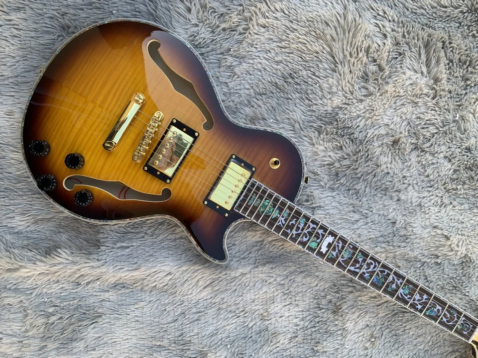 LP body F hole semi-hollow jazz guitar flame maple single side and back jazz guitar Customizable right hand
LP body F hole semi-hollow jazz guitar flame maple single side and back jazz guitar Customizable right hand