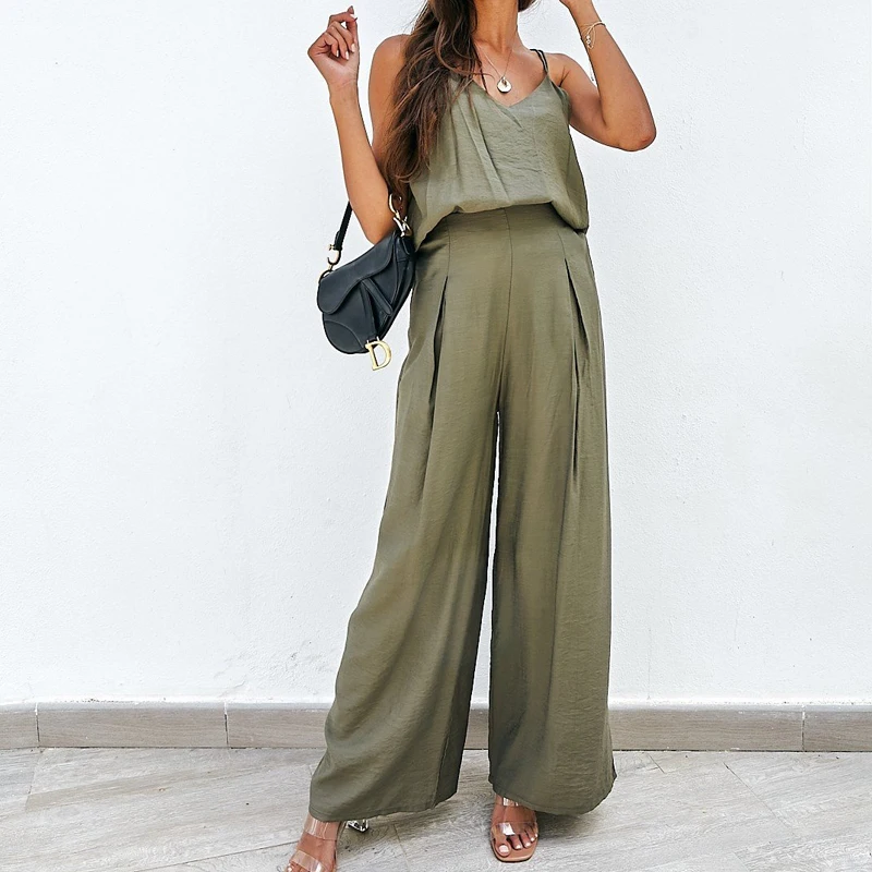 2022 Fashion Beach Loose Solid Outfit Summer Cool Thin Suspender Suit Female V-neck Top + Drape Long Pants Casual Two Piece Set
2022 Fashion Beach Loose Solid Outfit Summer Cool Thin Suspender Suit Female V-neck Top + Drape Long Pants Casual Two Piece Set