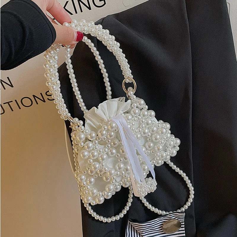 Simply Portable Handbags Women's Pearl Small Bucket Bag Summer 2022 New Fashion Crossbody Pack Versatile Travel Shoulder Bags
Simply Portable Handbags Women's Pearl Small Bucket Bag Summer 2022 New Fashion Crossbody Pack Versatile Travel Shoulder Bags