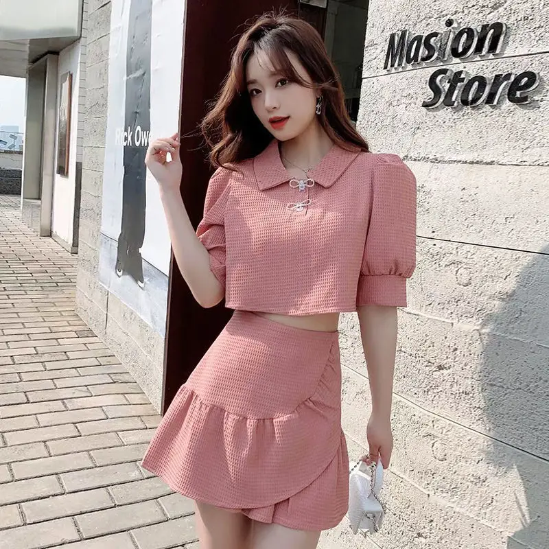 2022 Summer Women Sweet 2 Piece Sets Female Solid Color Short Shirt Tops and High Waist Mini A-line Skirts Ladies Suits Y166
2022 Summer Women Sweet 2 Piece Sets Female Solid Color Short Shirt Tops and High Waist Mini A-line Skirts Ladies Suits Y166