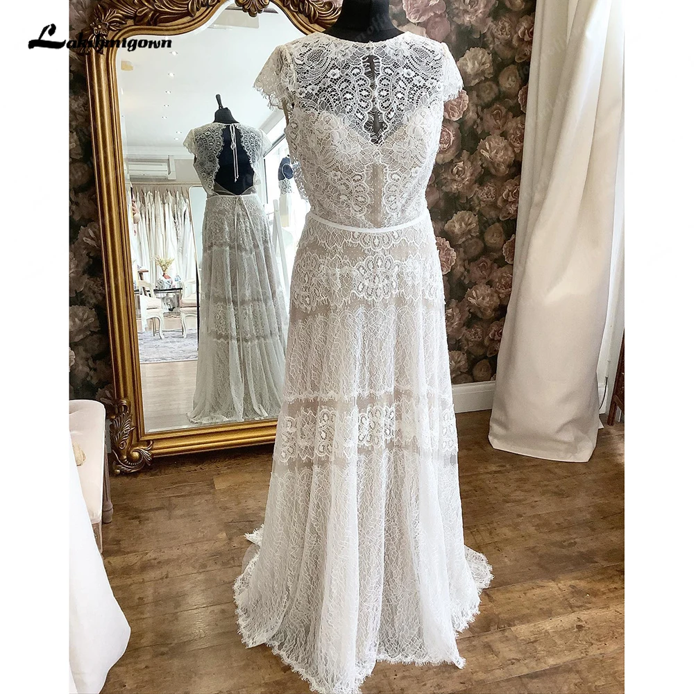 Lakshmigown Boho A Line Short Sleeve Beach Wedding Dresses Lace Buttons Open Back Sweep Train Bridal Gown vestido de fiesta de b
Lakshmigown Boho A Line Short Sleeve Beach Wedding Dresses Lace Buttons Open Back Sweep Train Bridal Gown vestido de fiesta de b