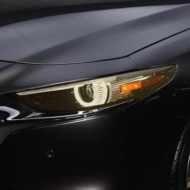 Аксессуары для Mazda 3 BP 2019 2020 2021, автомобисветильник фара, ярсветильник прозрачная Дымчатая черная наклейка из ТПУ
Аксессуары для Mazda 3 BP 2019 2020 2021, автомобисветильник фара, ярсветильник прозрачная Дымчатая черная наклейка из ТПУ