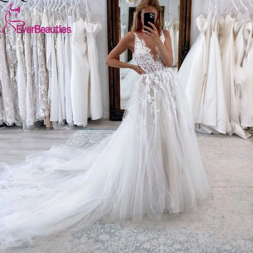 Tulle Appliques Wedding Dresses V-Neck Vestidos De Novia Beach Bride Dress 2023 Wedding Gown for Women Robe De Mariee
Tulle Appliques Wedding Dresses V-Neck Vestidos De Novia Beach Bride Dress 2023 Wedding Gown for Women Robe De Mariee