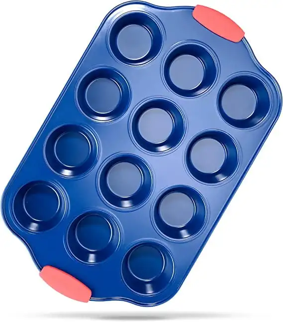 12 Cup Muffin Deluxe Blue Carbon Steel Non-Stick Baking Pan with Red Silicone Handles
12 Cup Muffin Deluxe Blue Carbon Steel Non-Stick Baking Pan with Red Silicone Handles