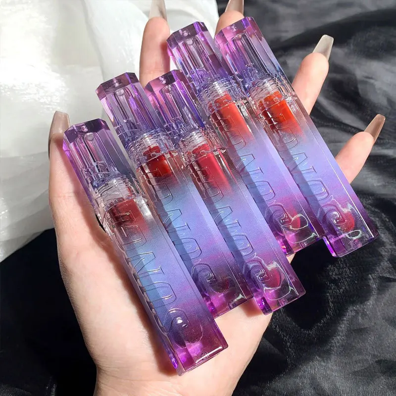 HELLOSTYLE Purple Glass Water Mirror Lip Glaze Lipstick Waterproof Long Lasting Moisturizing Colorful Shine Lip Care Makeup
HELLOSTYLE Purple Glass Water Mirror Lip Glaze Lipstick Waterproof Long Lasting Moisturizing Colorful Shine Lip Care Makeup