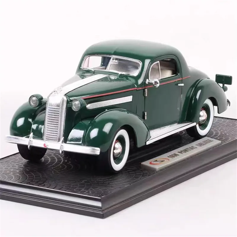 Модель автомобиля PONTIAC Deluxe из сплава под давлением в масштабе 1:18, модель классического ретро-автомобиля, коллекционная Подарочная витрина, ...
Модель автомобиля PONTIAC Deluxe из сплава под давлением в масштабе 1:18, модель классического ретро-автомобиля, коллекционная Подарочная витрина, ...