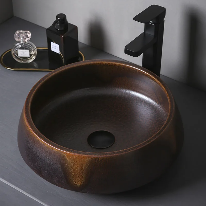 

Ceramic Art Basin Sinks Counter Top Wash Basin Vessel Sinks Oval Washing Basin Bathroom Sinks Ceramic Wash Basin with Faucets