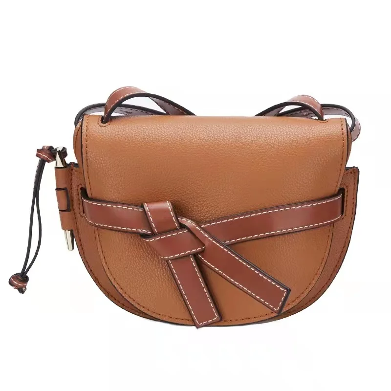 Leather women's bag 2022 new bow saddle bag cowhide small bag trend Single Shoulder Messenger star bag
Leather women's bag 2022 new bow saddle bag cowhide small bag trend Single Shoulder Messenger star bag