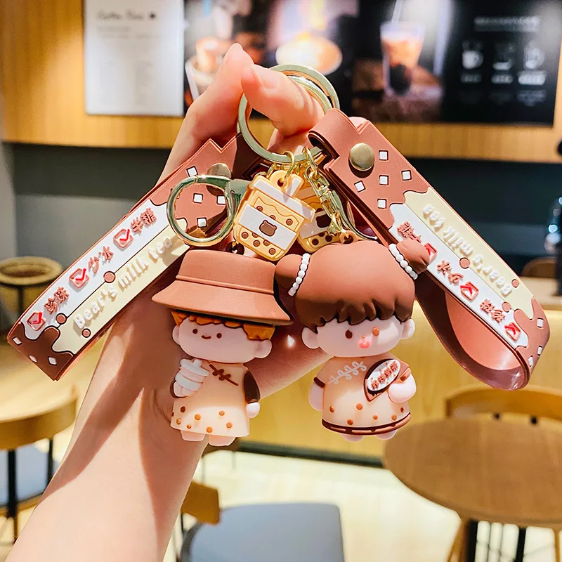 Изысканный жемчужный брелок для ключей в виде молочного чая для женщин
Изысканный жемчужный брелок для ключей в виде молочного чая для женщин