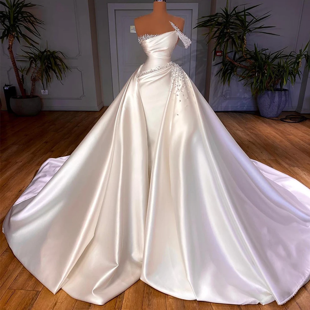 Ball Gown Wedding Dress With Removable Train Pearls Beading Pleat Luxury Wedding Gown Sleeveless Satin Modern Bridal Dresses
Ball Gown Wedding Dress With Removable Train Pearls Beading Pleat Luxury Wedding Gown Sleeveless Satin Modern Bridal Dresses