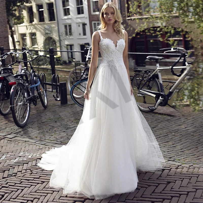 Simple White Wedding Dresses Appliques Open Back Vestidos De Novia Boho Boho Spaghetti Strap A-Line Robe De Mariee Charming
Simple White Wedding Dresses Appliques Open Back Vestidos De Novia Boho Boho Spaghetti Strap A-Line Robe De Mariee Charming