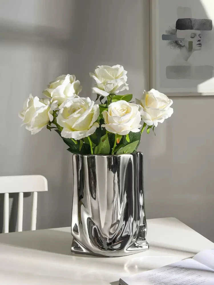 Nordic golden ceramic vase electroplating gold cloth bag ceramic vase living room TV cabinet furniture decoration ornaments vase
Nordic golden ceramic vase electroplating gold cloth bag ceramic vase living room TV cabinet furniture decoration ornaments vase