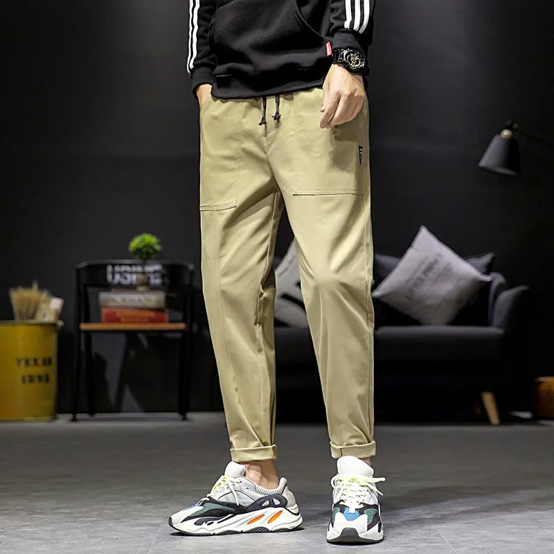 Мужские весенне-осенние повседневные модные Универсальные свободные шаровары, рабочая одежда, брюки с ремешком на щиколотке, спортивные ул... 
Мужские весенне-осенние повседневные модные Универсальные свободные шаровары, рабочая одежда, брюки с ремешком на щиколотке, спортивные ул...