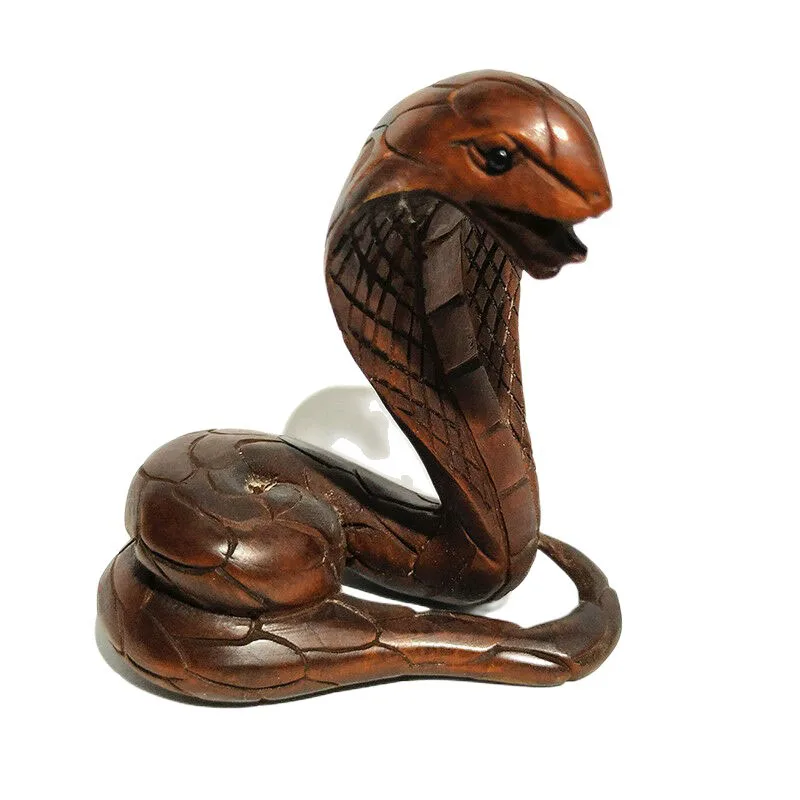 Фигурка змеи из самшита
Фигурка змеи из самшита