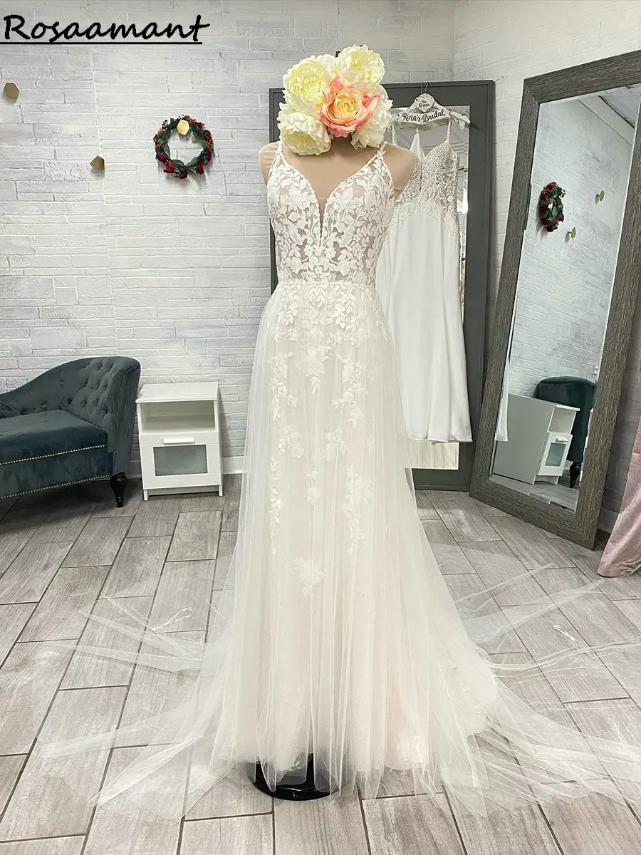 Real Image Spaghetti Straps Open Back Wedding Dresses A-Line Sleeveless Illusion Appliques Lace Boho Bridal Gowns
Real Image Spaghetti Straps Open Back Wedding Dresses A-Line Sleeveless Illusion Appliques Lace Boho Bridal Gowns