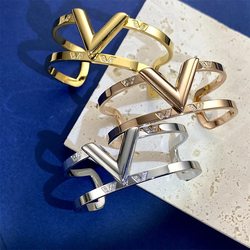 Titanium Stainless Steel 18k White Gold Plated Punk Open Cuff Bangle Simple V Letter Alphabet Exaggerated Wide Band Bracelet
Titanium Stainless Steel 18k White Gold Plated Punk Open Cuff Bangle Simple V Letter Alphabet Exaggerated Wide Band Bracelet