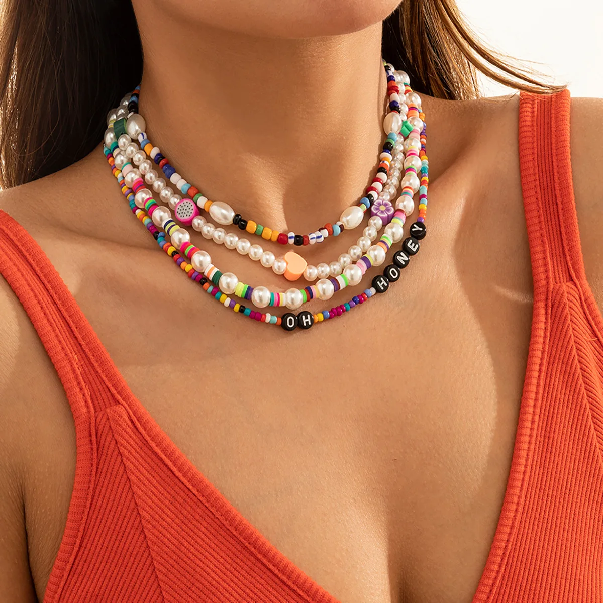 Mixed-color beaded soft pottery necklace retro imitation pearl heart-shaped letter necklace
Mixed-color beaded soft pottery necklace retro imitation pearl heart-shaped letter necklace