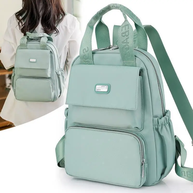 Fashion Women's Bag Cute Student Backpack Large Capacity Multi-pocket Nylon Cloth Backpack Outdoor Travel Waterproof Mommy Bag 
Fashion Women's Bag Cute Student Backpack Large Capacity Multi-pocket Nylon Cloth Backpack Outdoor Travel Waterproof Mommy Bag