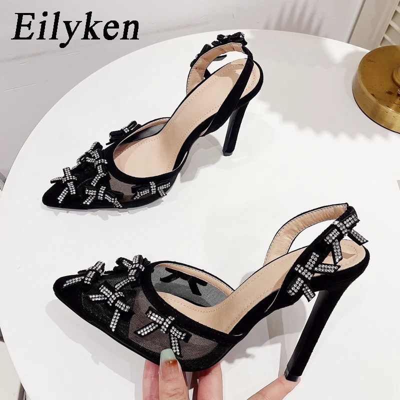 

Eilyken/женские туфли-лодочки с ремешком на пятке; Пикантные туфли на высоком каблуке-шпильке с острым носком, украшенные кристаллами и бантом; ...