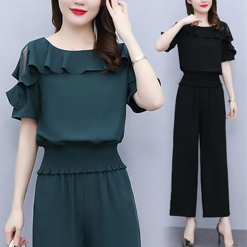 Oversize Women Summer Clothing Set Fashion High Waist Wide Leg Pants & Short Sleeve Tops Two Pieces Suits Good Quality E116
Oversize Women Summer Clothing Set Fashion High Waist Wide Leg Pants & Short Sleeve Tops Two Pieces Suits Good Quality E116