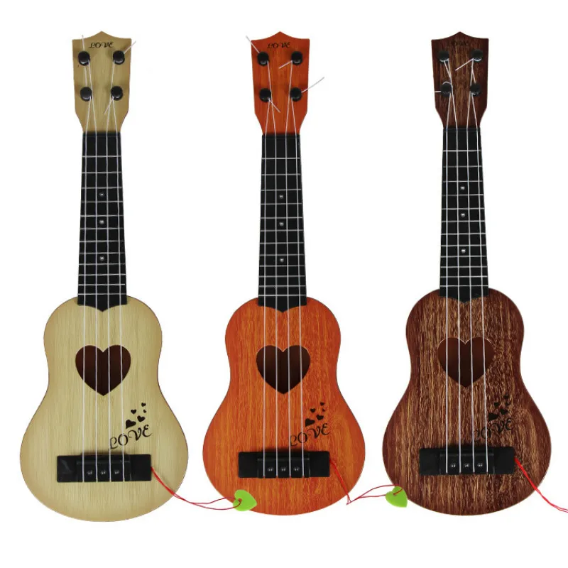 Early Childhood Education Guitar Toy Classical Ukulele Guitar Instrument Simulation Small Guitar Kindergarten Instrument Four-St
Early Childhood Education Guitar Toy Classical Ukulele Guitar Instrument Simulation Small Guitar Kindergarten Instrument Four-St