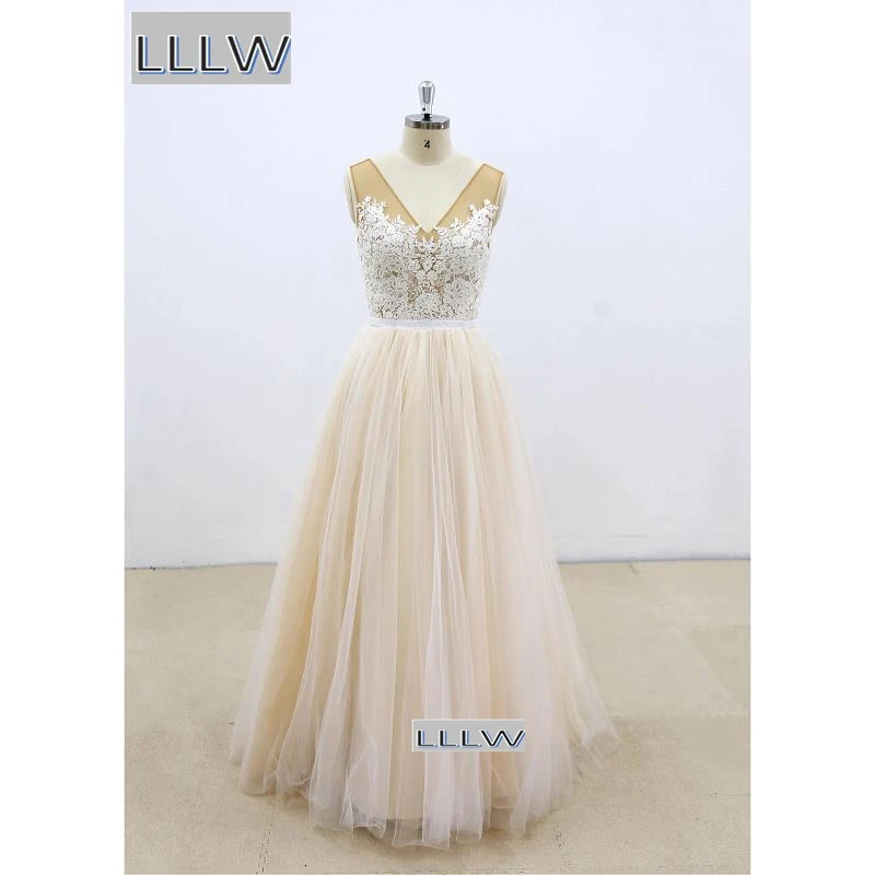 Simple Champagne Tulle Lace A-Line Wedding Dresses Custom Made Floor-Length V-Neck Sleeveless Bridal Gowns
Simple Champagne Tulle Lace A-Line Wedding Dresses Custom Made Floor-Length V-Neck Sleeveless Bridal Gowns
