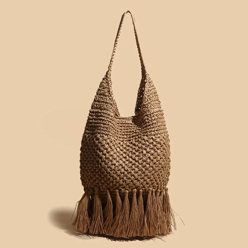 2022 tassel straw bag woven rattan shoulder messenger bag new beach handbag women
2022 tassel straw bag woven rattan shoulder messenger bag new beach handbag women