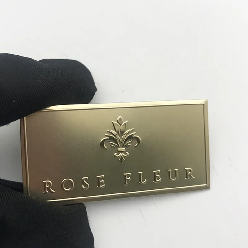 Custom self adhesive metal logo matte gold embossed stickers perfume bottle labels 
Custom self adhesive metal logo matte gold embossed stickers perfume bottle labels