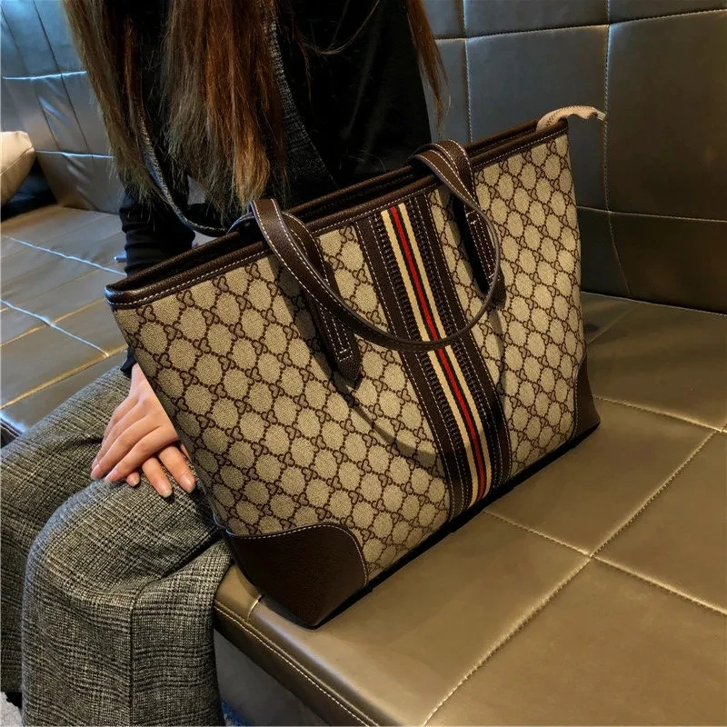 Women's bag popular high-grade niche Single shoulder bag Large capacity Shopping commuter tote bag
Women's bag popular high-grade niche Single shoulder bag Large capacity Shopping commuter tote bag