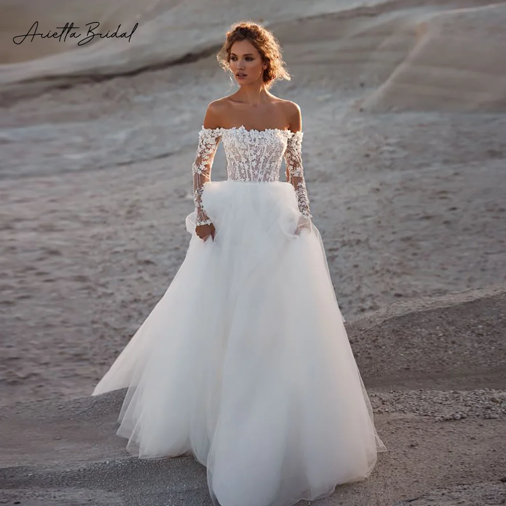 Arietta Off the Shoulder Beach Wedding Dresses Long Sleeves Lace Appliques A-Line Bridal Gowns 2023 Boho Tulle Wedding Gowns
Arietta Off the Shoulder Beach Wedding Dresses Long Sleeves Lace Appliques A-Line Bridal Gowns 2023 Boho Tulle Wedding Gowns