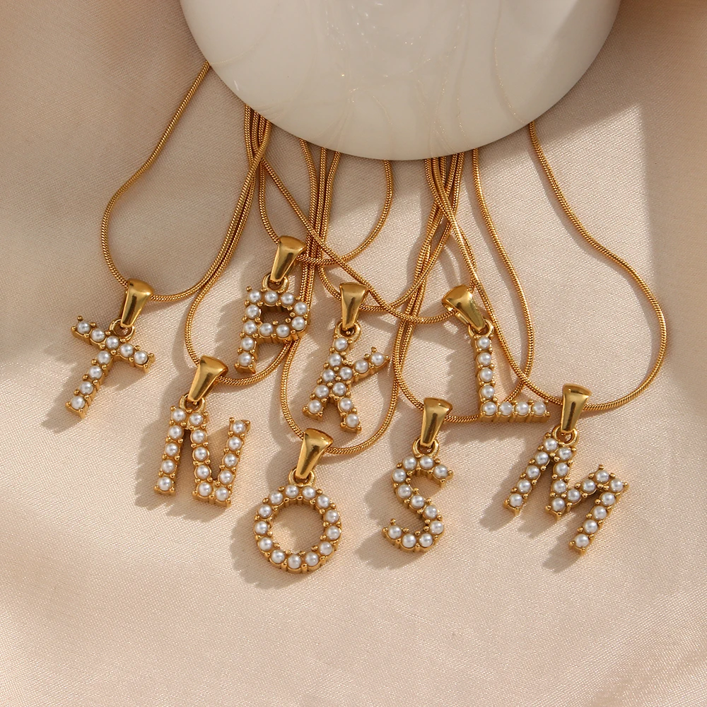 2023 New elegant 18K Gold-Plated Stainless Steel Fine Snake Chain Necklace Women's 26 Initial Letter Pearl Pendant Necklace
2023 New elegant 18K Gold-Plated Stainless Steel Fine Snake Chain Necklace Women's 26 Initial Letter Pearl Pendant Necklace