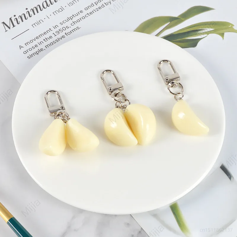 PVC Simulation Garlic Keychain for Airpods Backpack Pendant Car Key Chains Student Couple Bag Charms Jewelry
PVC Simulation Garlic Keychain for Airpods Backpack Pendant Car Key Chains Student Couple Bag Charms Jewelry