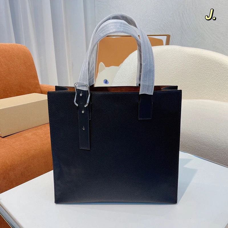 New Simple Leather Handbag Men'S And Women'S Shopping Bag Large Capacity Travel Bag Commuter Computer Bag Tote Briefcase
New Simple Leather Handbag Men'S And Women'S Shopping Bag Large Capacity Travel Bag Commuter Computer Bag Tote Briefcase
