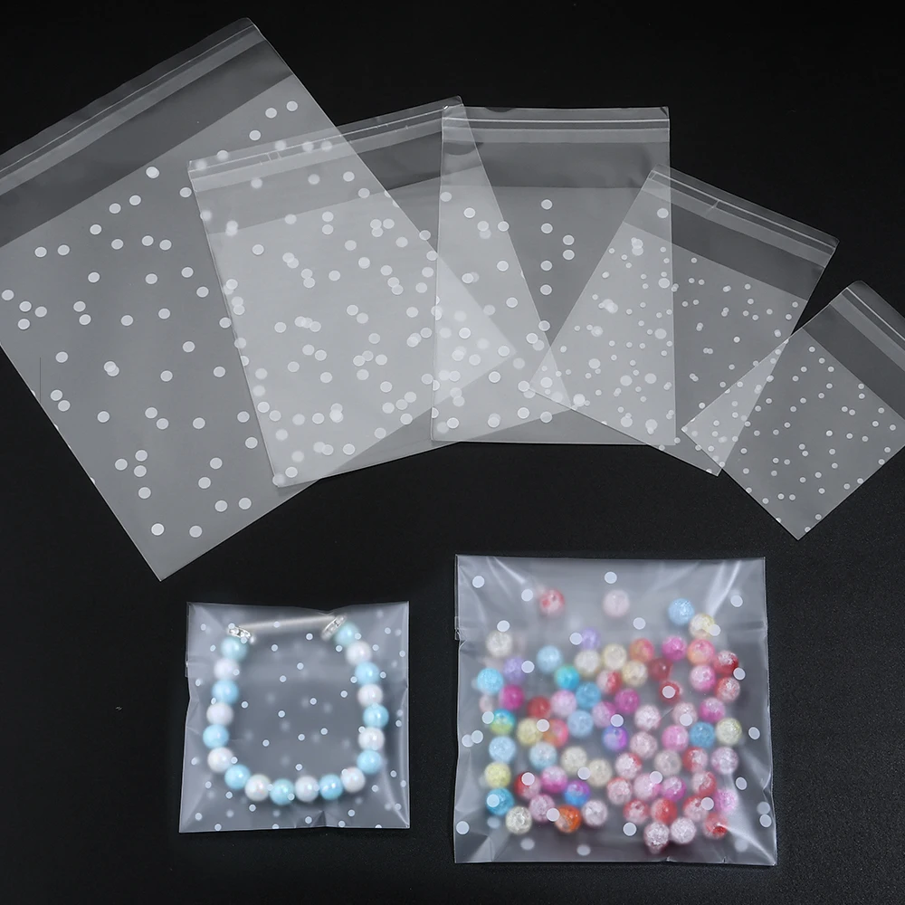 Самозапечатывающиеся подарочные пакеты, белые с горошком, пластиковые
Самозапечатывающиеся подарочные пакеты, белые с горошком, пластиковые