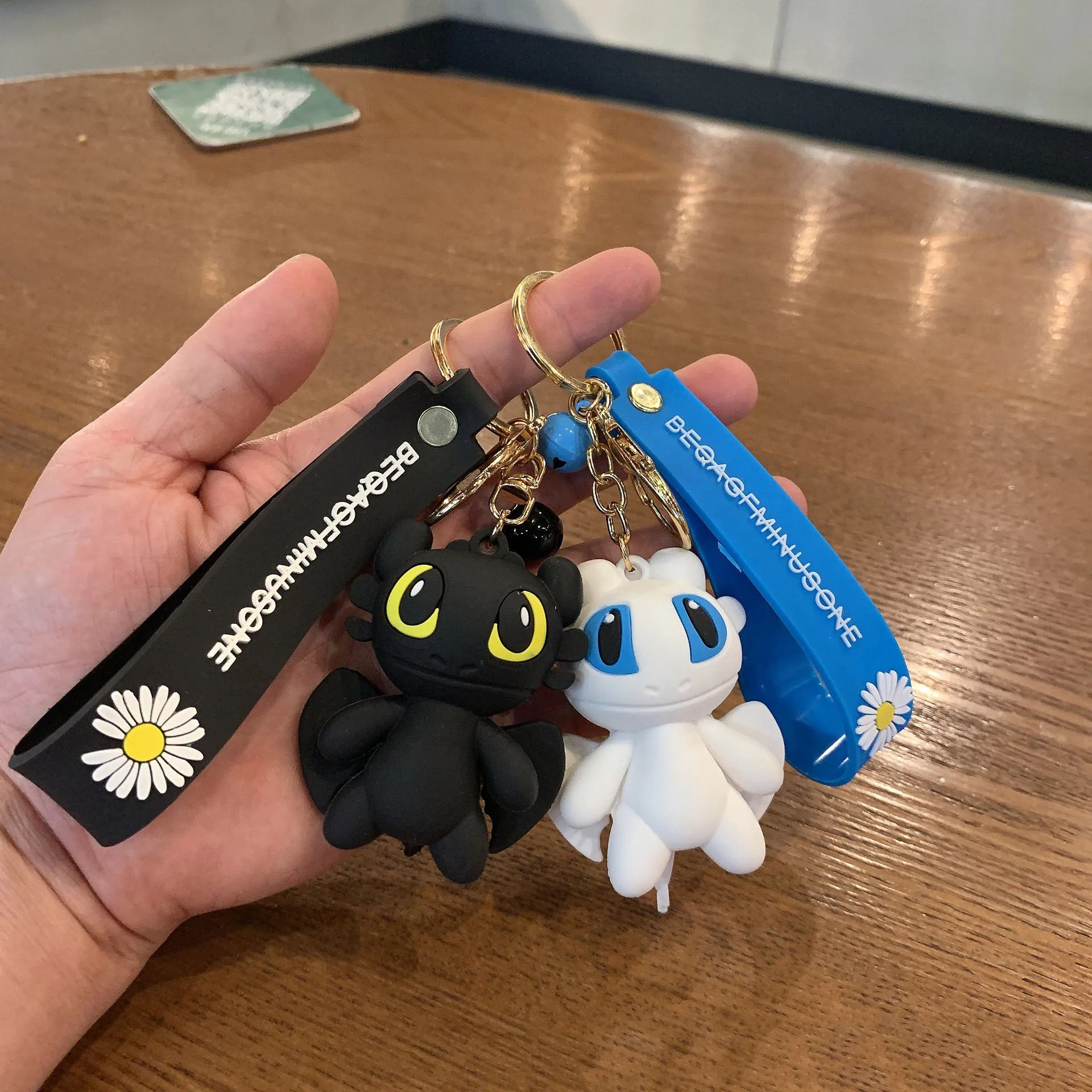 Fashion Cartoon Black and White Flying Dragon Doll Keychain Creative PVC Toy Figurines Unisex Student Bag Car Pendant Keyring
Fashion Cartoon Black and White Flying Dragon Doll Keychain Creative PVC Toy Figurines Unisex Student Bag Car Pendant Keyring